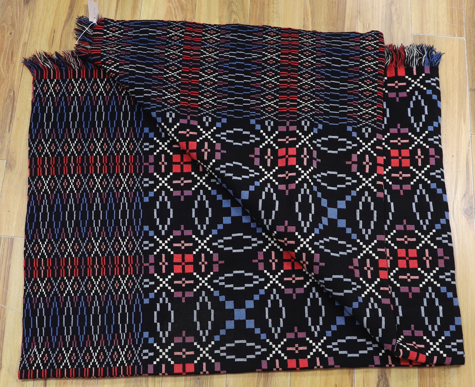 A Welsh blanket, 221 x 163cm.